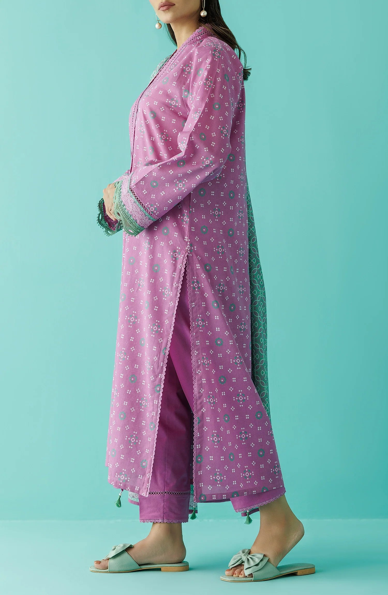 Woman wearing a pink traditional outfit with a green dupatta with a plain traditional trouser. Unstitched Printed Lawn Shirt Dupatta & Pant - 3 Piece Suits - OTL-20015