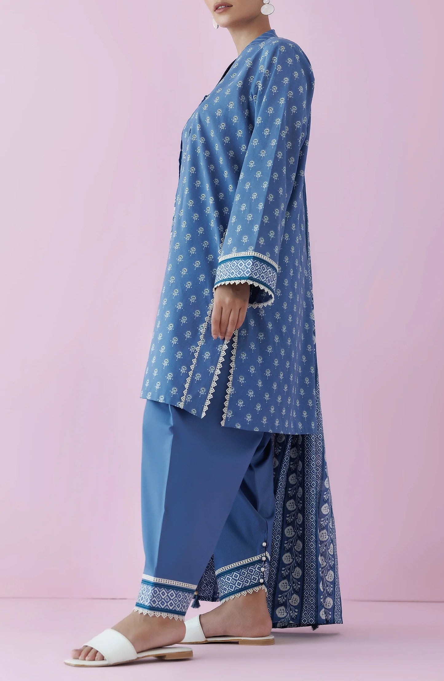 Woman wearing a blue traditional outfit with a matching dupatta on a dyed plain shalwar. Unstitched Printed Lawn Shirt Dupatta & Pant - 3 Piece Suits - OTL-20195