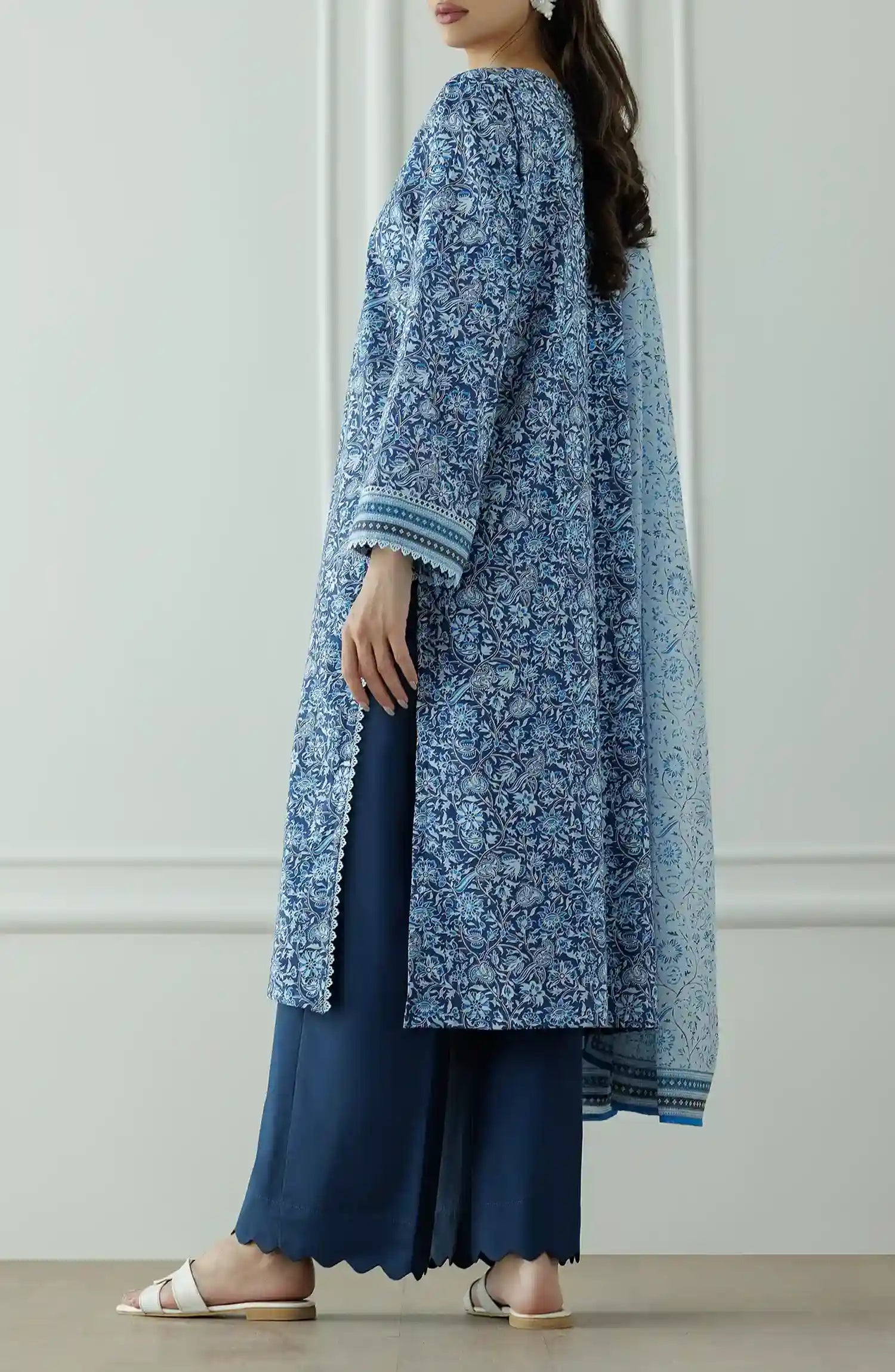 Stitched Printed Lawn Shirt Dupatta & Pant - 3 Piece - OTL-25-044. Woman wearing a patterned dress with a matching dupatta.