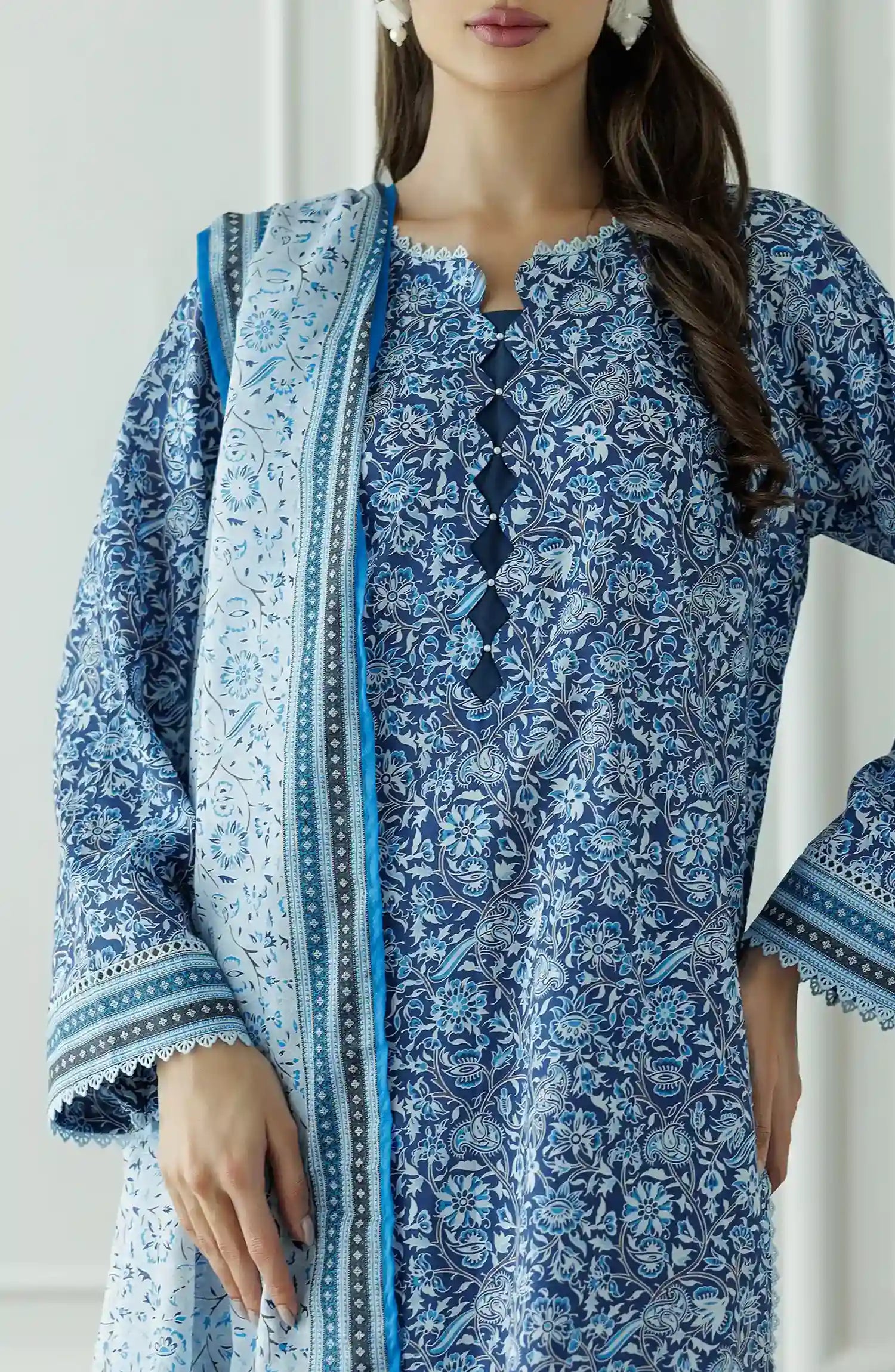 Stitched Printed Lawn Shirt Dupatta & Pant - 3 Piece - OTL-25-044. Woman wearing a patterned dress with a matching dupatta.