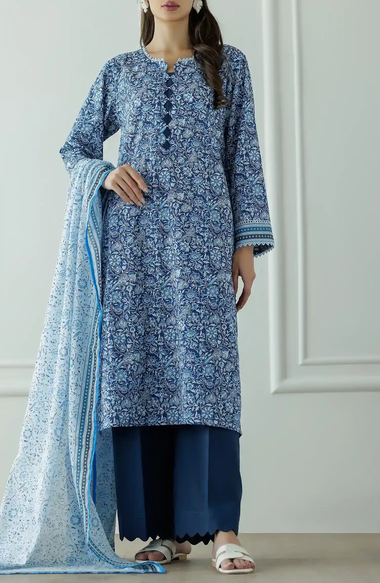 Stitched Printed Lawn Shirt Dupatta & Pant - 3 Piece - OTL-25-044. Woman wearing a patterned dress with a matching dupatta.