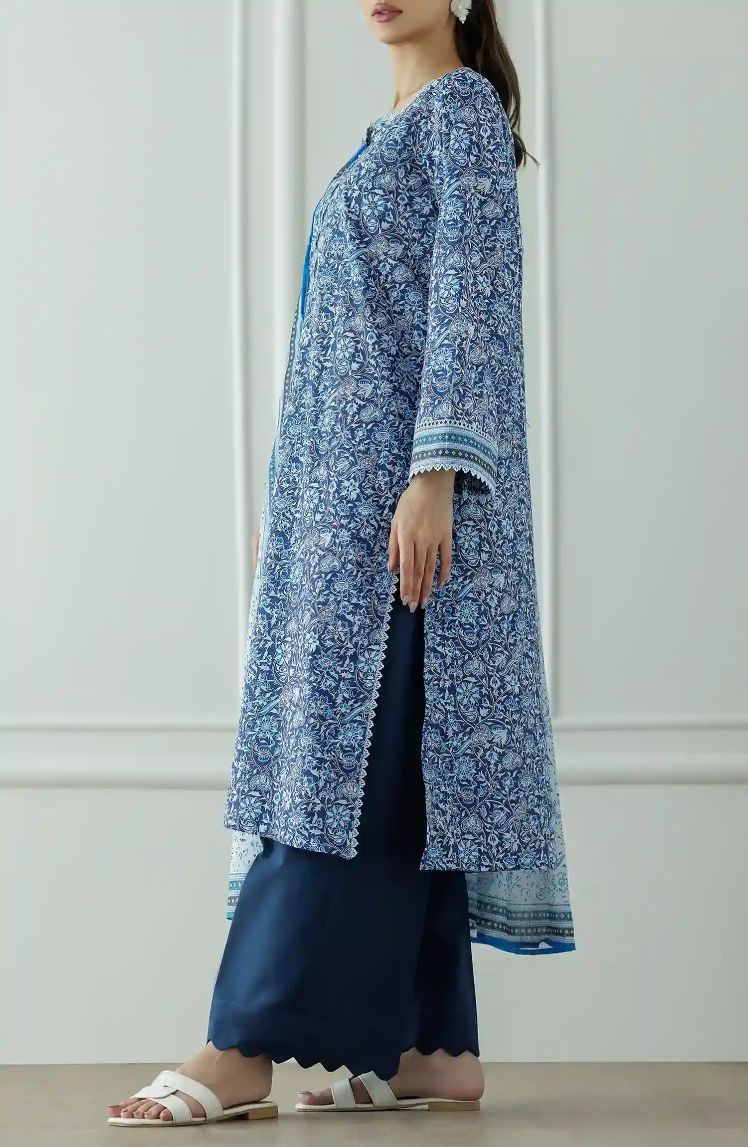 Stitched Printed Lawn Shirt Dupatta & Pant - 3 Piece - OTL-25-044. Woman wearing a patterned dress with a matching dupatta.