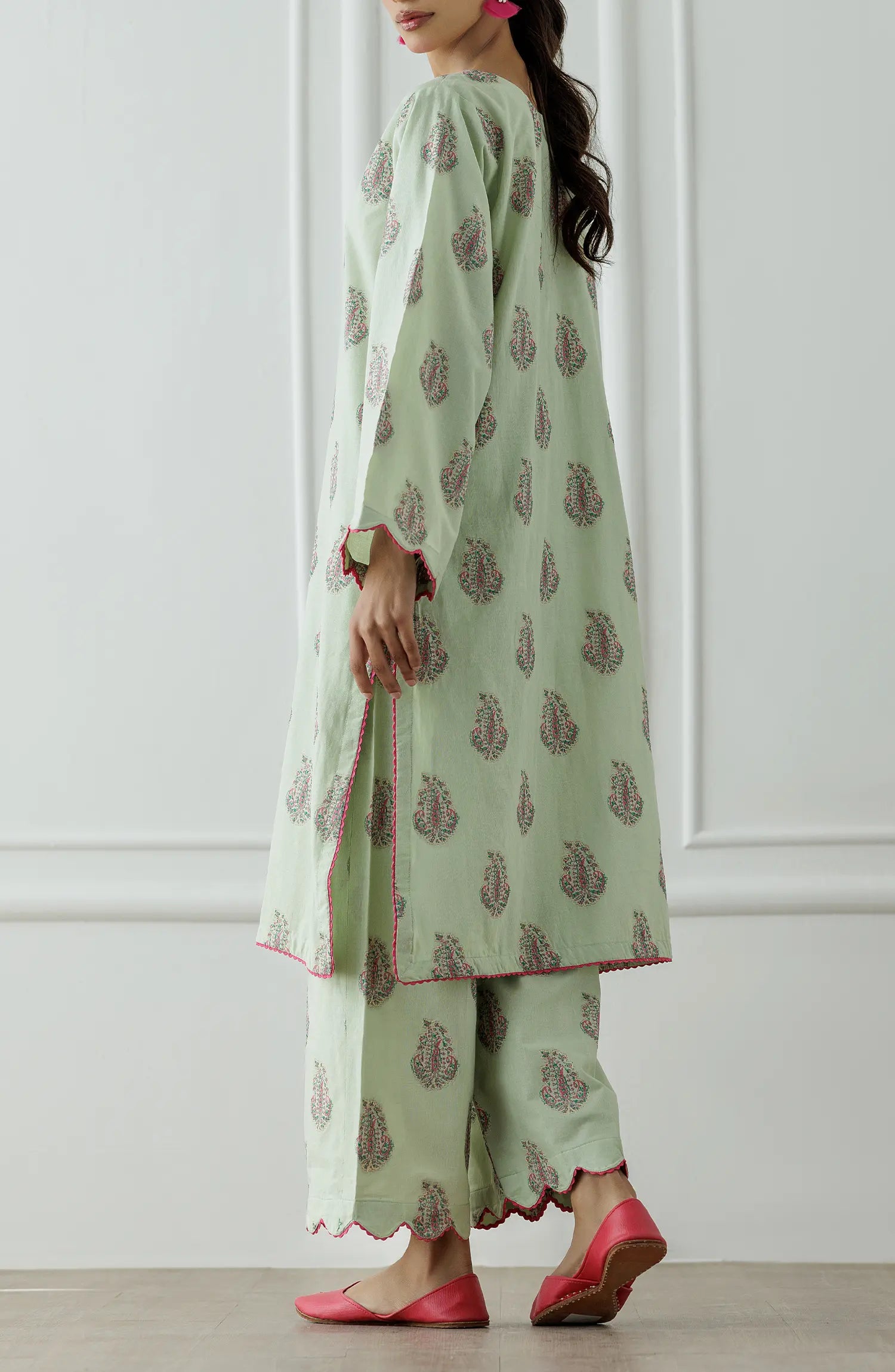 Stitched Dyed embroidered Lawn Jacquard Shirt & Pant - 2 Piece (CordSet) - WRHJ25S-2002. Light green dress with floral patterns and ruffled sleeves on a printed bottom.