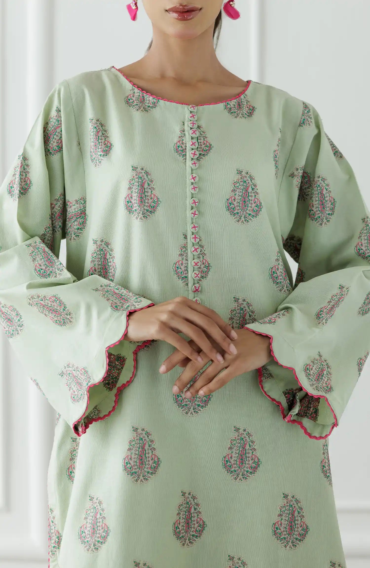 Stitched Dyed embroidered Lawn Jacquard Shirt & Pant - 2 Piece (CordSet) - WRHJ25S-2002. Light green dress with floral patterns and ruffled sleeves on a printed bottom.