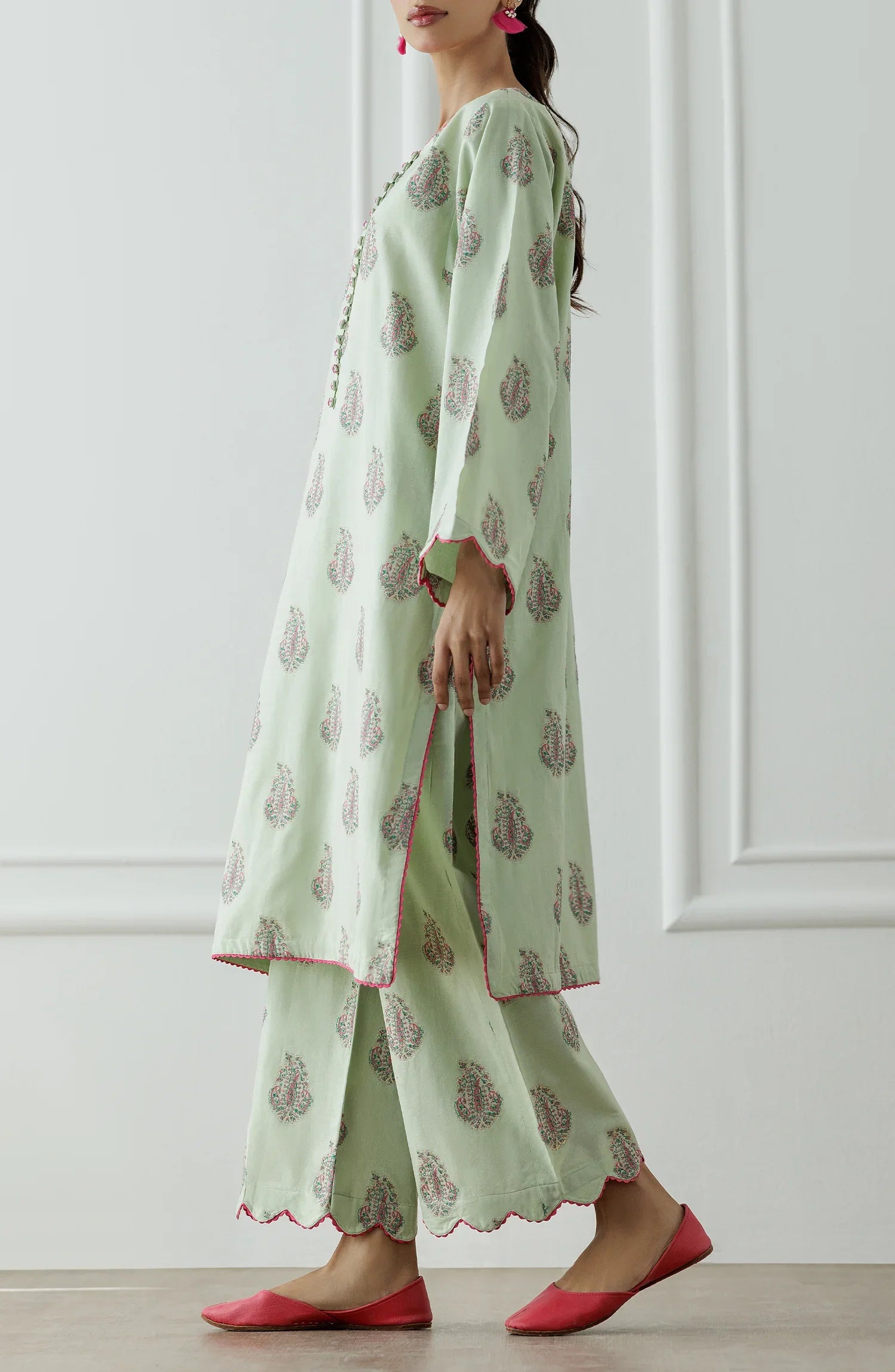 Stitched Dyed embroidered Lawn Jacquard Shirt & Pant - 2 Piece (CordSet) - WRHJ25S-2002. Light green dress with floral patterns and ruffled sleeves on a printed bottom.
