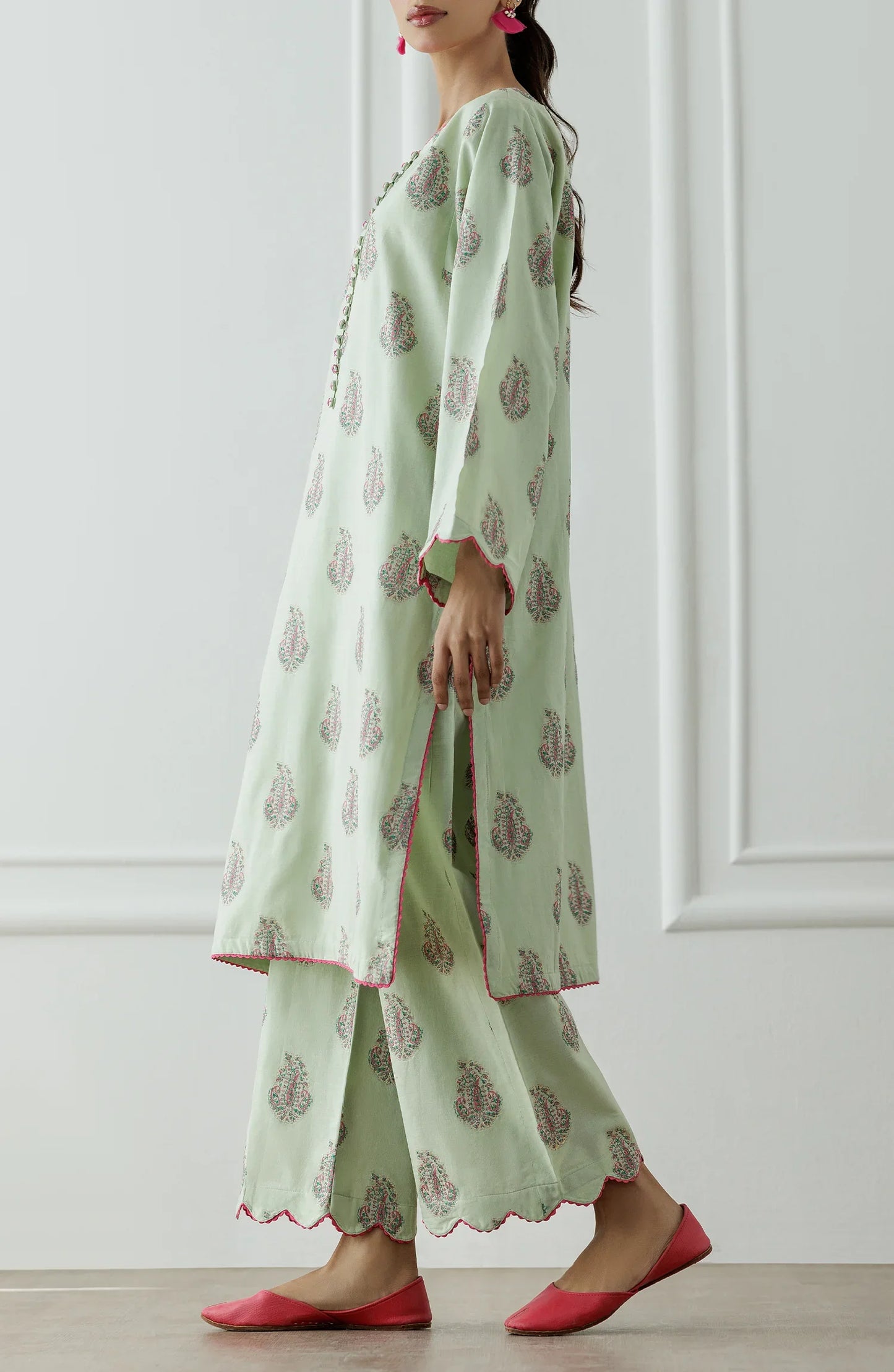 Stitched Dyed embroidered Lawn Jacquard Shirt & Pant - 2 Piece (CordSet) - WRHJ25S-2002. Light green dress with floral patterns and ruffled sleeves on a printed bottom.