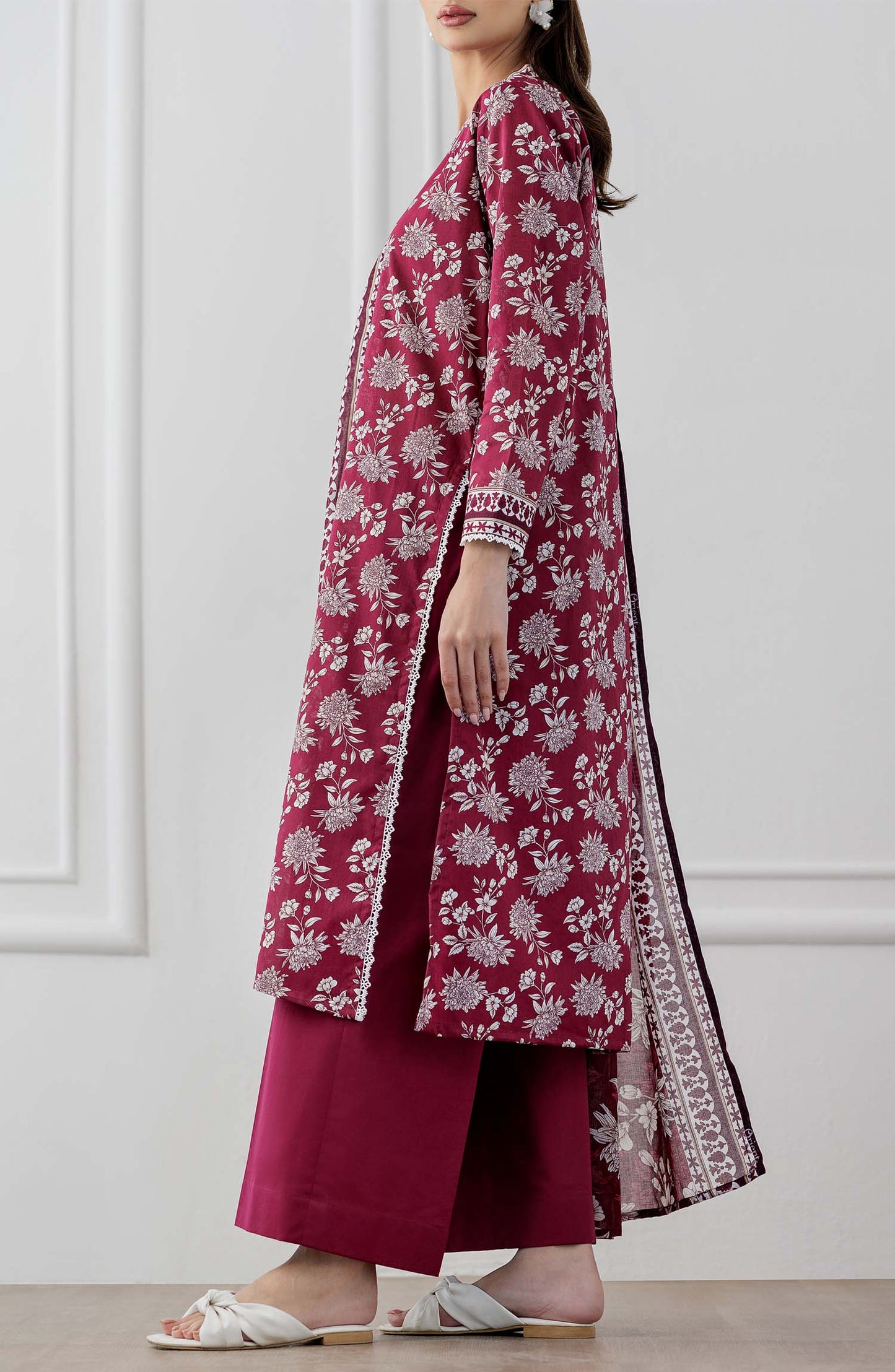 UNSTITCHED Printed Lawn Shirt Dupatta & Pant - 3 Piece Suits - OTL-25-060. Woman wearing a maroon floral dress with white patterns with printed dupatta on a plain trouser.