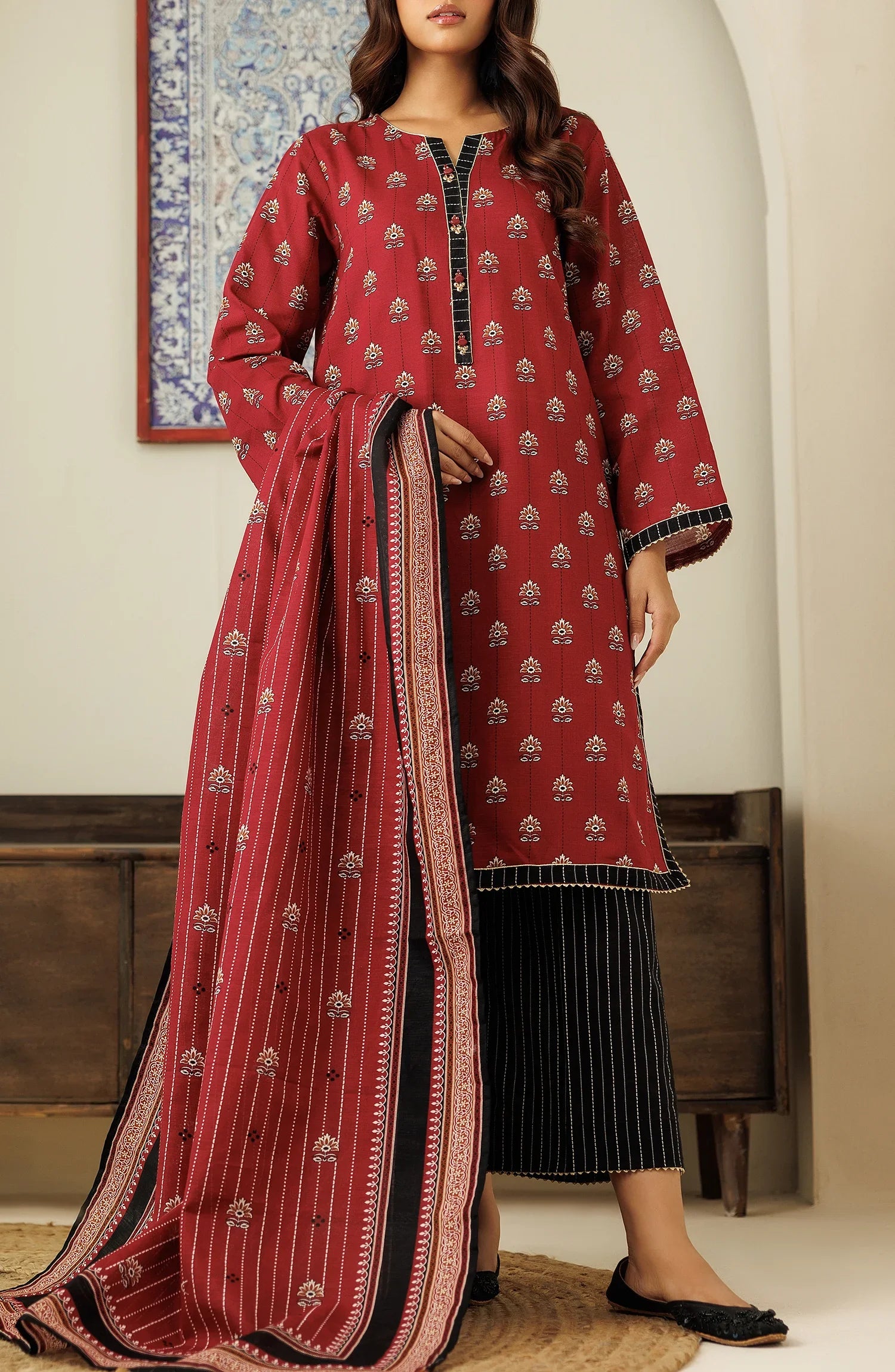 Woman wearing a red traditional outfit with a matching dupatta in a dyed trouser. Unstitched Printed Lawn Shirt Dupatta & Pant - 3 Piece Suits - OTL-20085