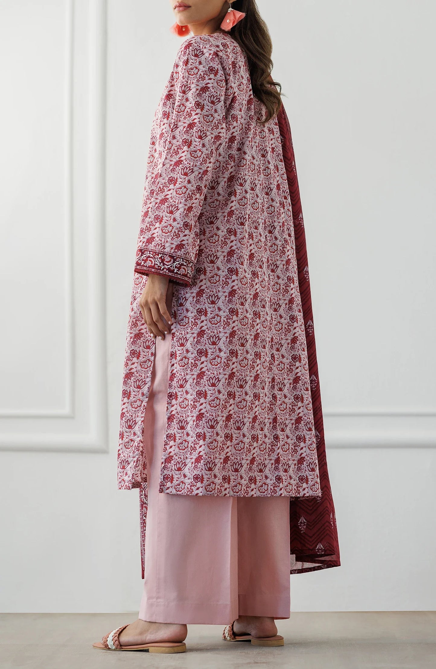 Woman wearing a pink and red floral kurta with a matching dupatta on a dyed trouser. Unstitched Printed Lawn Shirt Dupatta & Pant - 3 Piece Suits - OTL-25-071